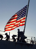 Flag photo by Paul Farley, courtesy of the U.S. Navy
