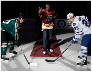 Maurice drops the puck at a Chicago Wolves hockey game