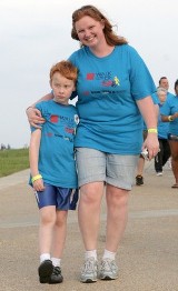 Kyle and his mom walking