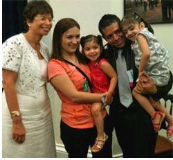 Chelsy, Rebeka and their parents with Valerie Jarrett, senior advisor and assistant to the president