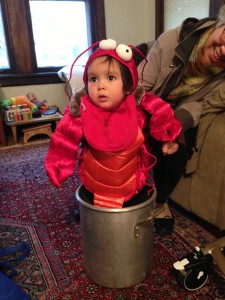 Elena in lobster costume in a pot
