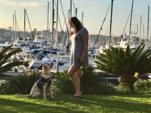 Bryana and Leana standing in front of a harbor