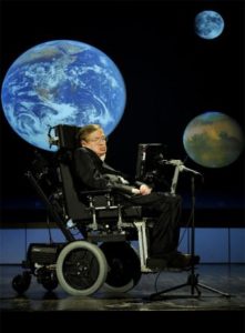 Stephen Hawking lecturing in front of an image of Earth 
