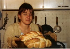 Beth with two loaves of the egg braid bread