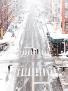 An aerial view of a snowy street