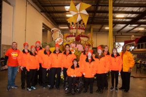 Easterseals Southern California CEO Mark Whitley (left) and Easterseals National CEO Angela F. Williams (right), with the Rose Parade float riders.