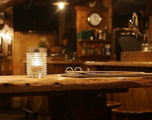 a cozy pub with wooden table