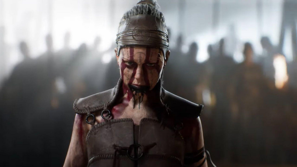 Video game character Senua, a woman wearing Viking attire and with red face paint